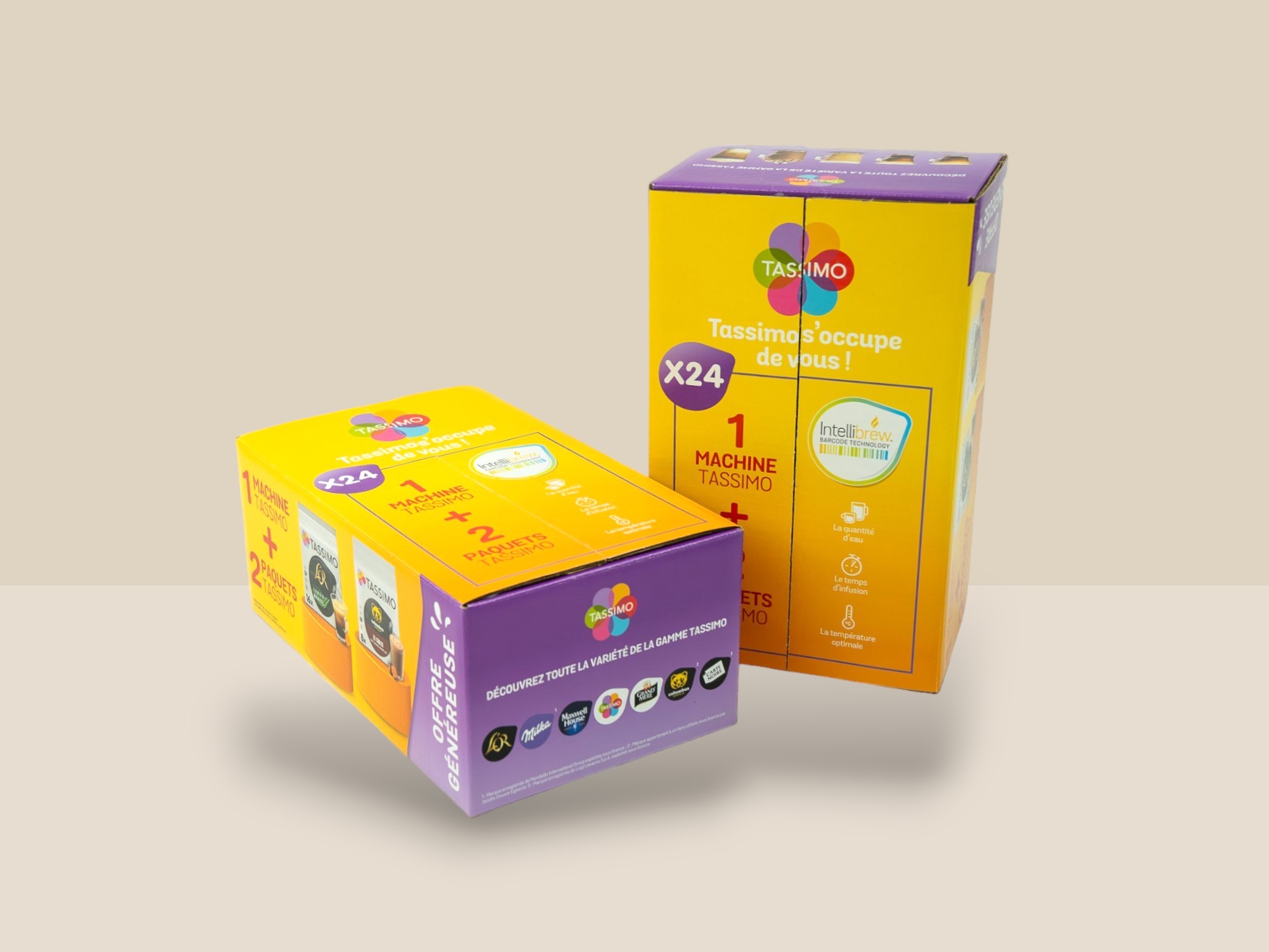 Caisse de couleur jaune et violet avec le logo Tassimo destinée à contenir des sachets de café au nombre de 24.